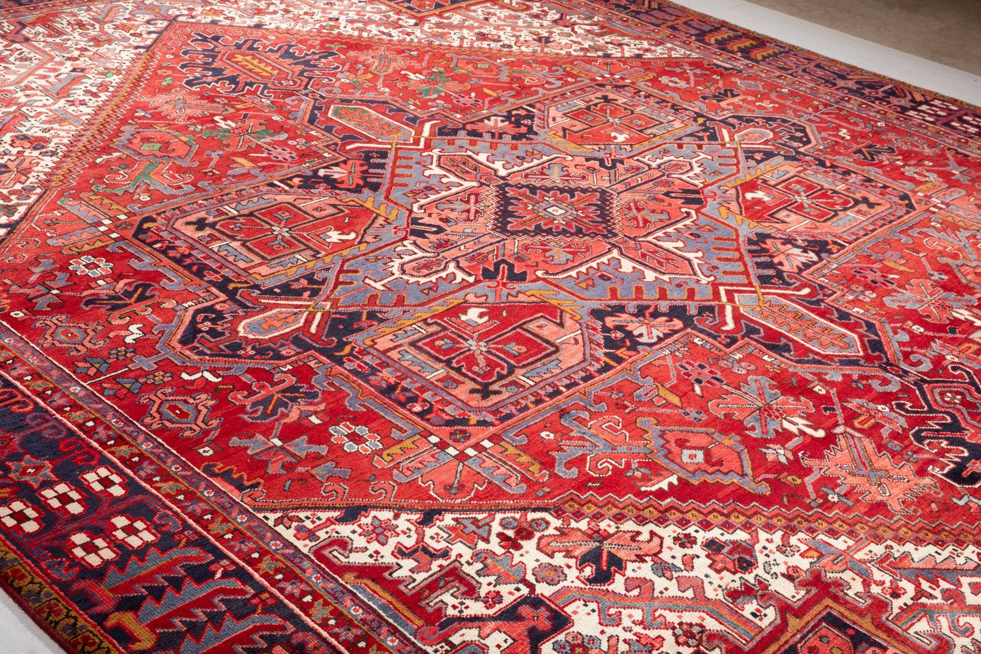 Diagonal close view of the rug's medallion pattern stretching across its width.