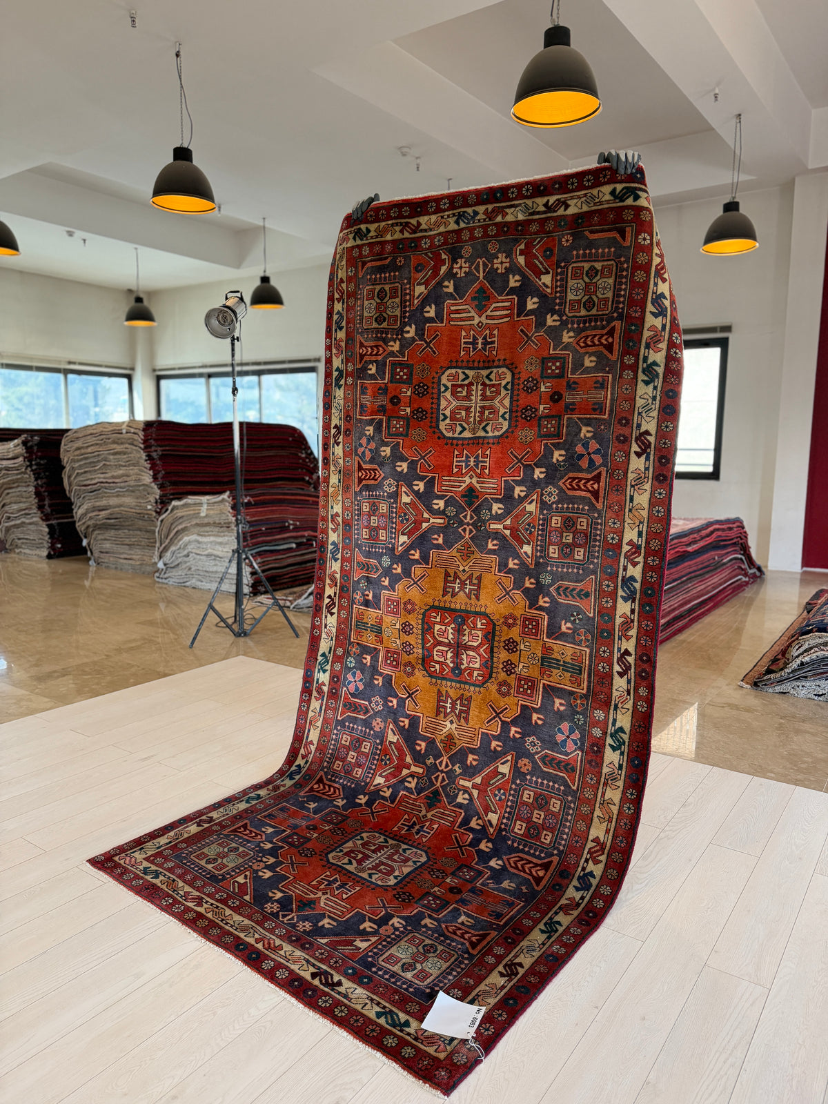 Vintage Navy Blue & Red Geometric Medallion Wool Rug – 9' 3" x 4' 4" (282 x 131 cm)