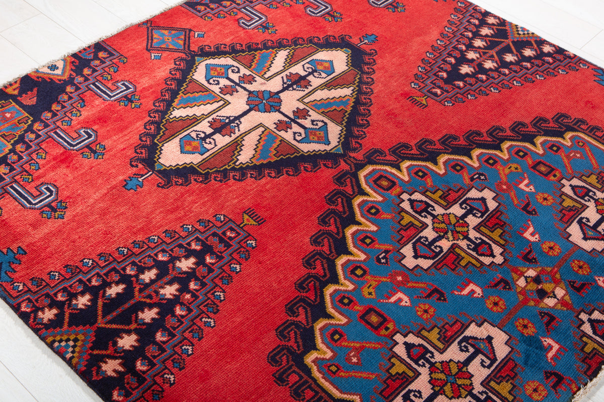 Vintage Red & Blue Geometric Medallion Wool Rug – 5' 0" x 5' 4" (152 x 162 cm)