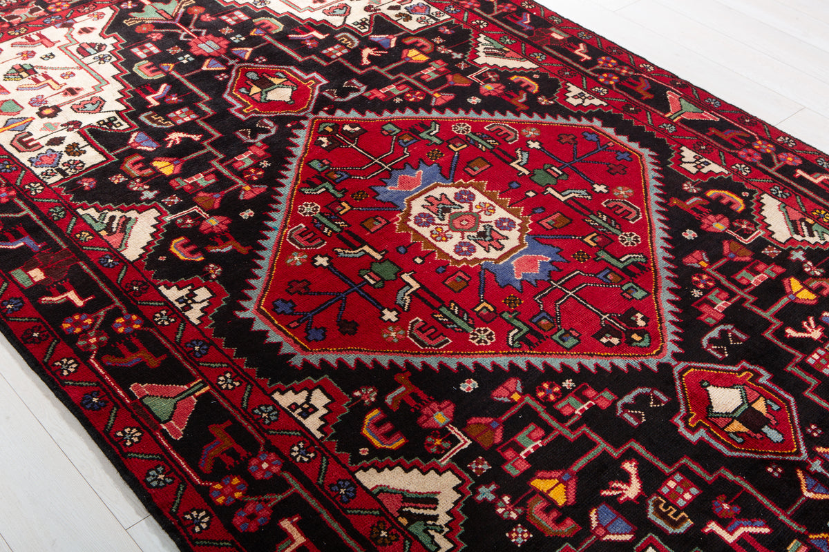 Vintage Deep Navy Blue & Red Geometric Medallion Wool Rug – 9' 7" x 5' 7" (293 x 169 cm)