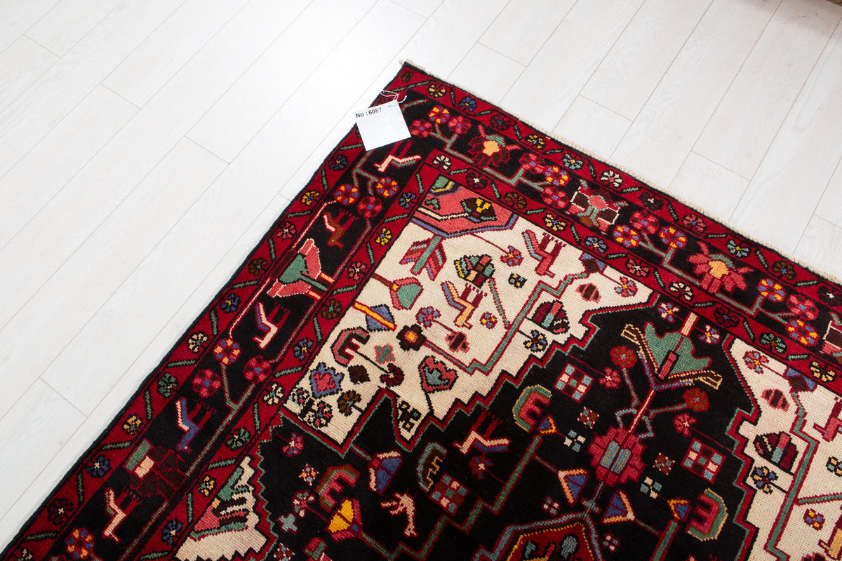 Vintage Deep Navy Blue & Red Geometric Medallion Wool Rug – 9' 7" x 5' 7" (293 x 169 cm)