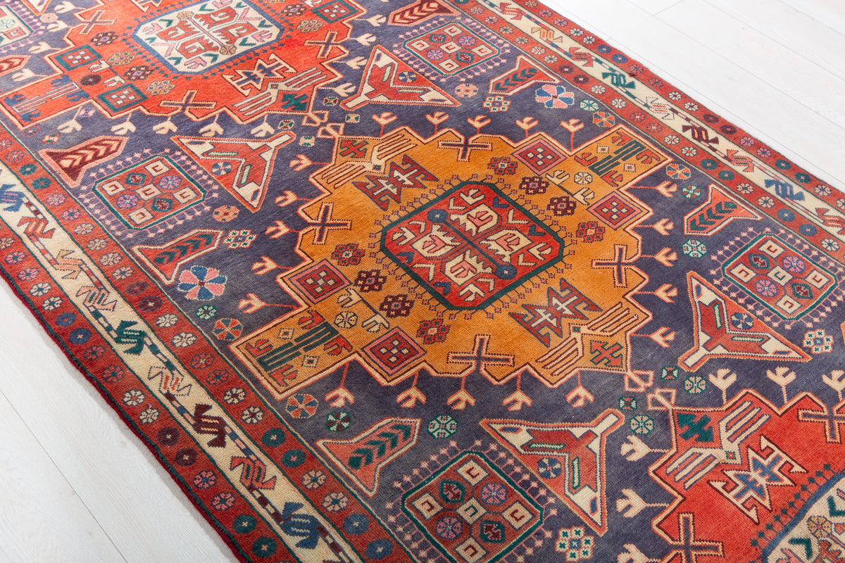 Vintage Navy Blue & Red Geometric Medallion Wool Rug – 9' 3" x 4' 4" (282 x 131 cm)