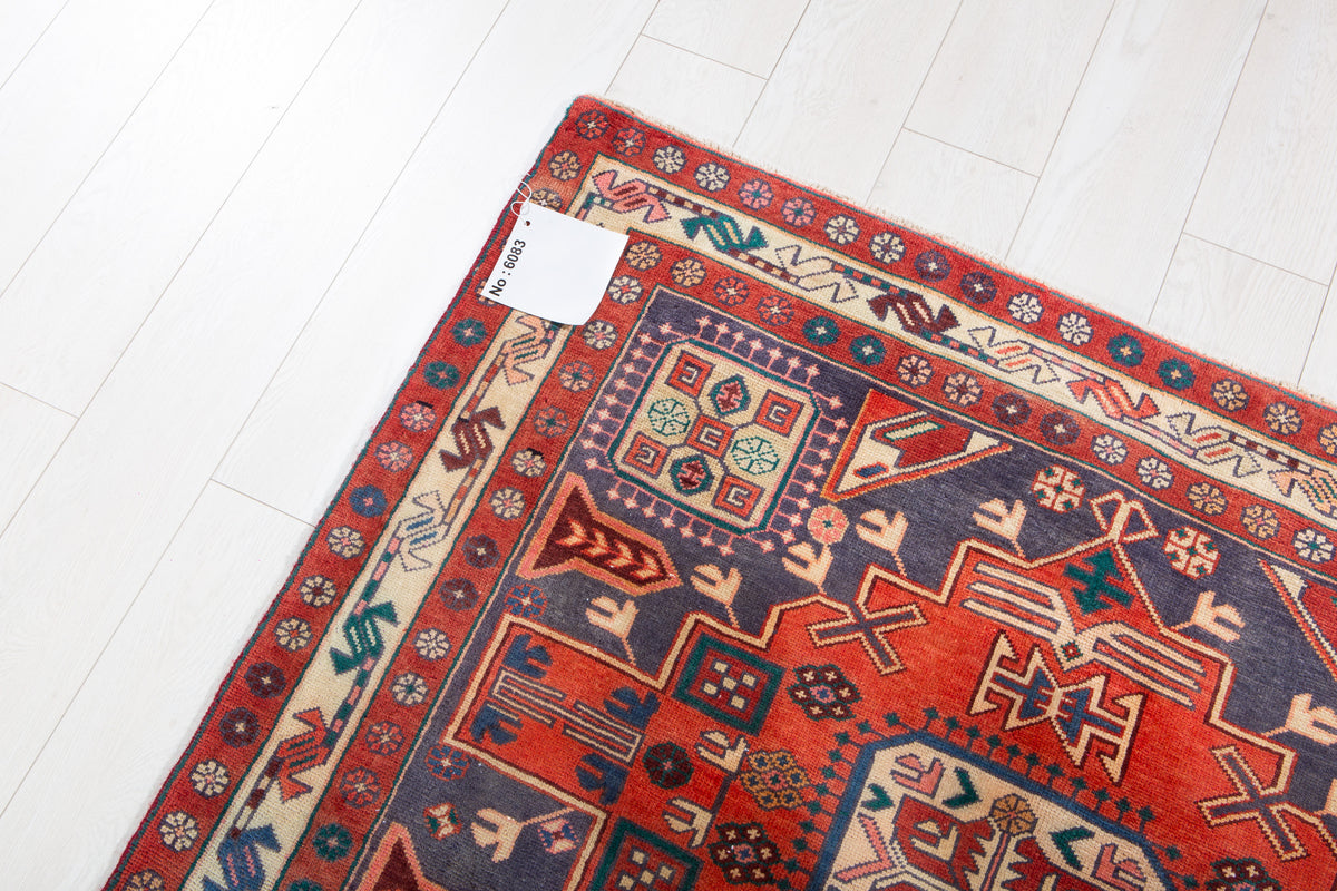 Vintage Navy Blue & Red Geometric Medallion Wool Rug – 9' 3" x 4' 4" (282 x 131 cm)