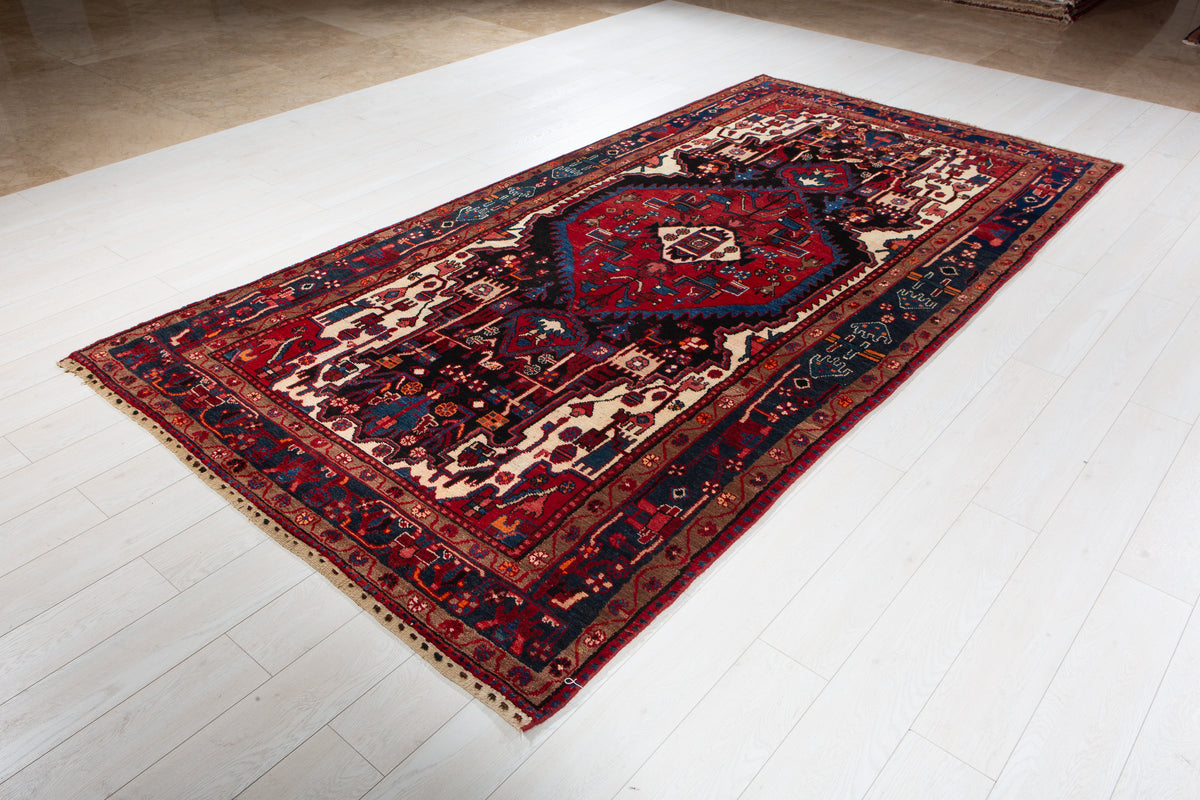 Antique Navy Blue & Red Geometric Medallion Wool Rug – 10' 5" x 5' 3" (317 x 161 cm)