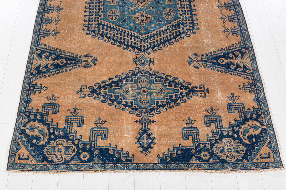 Collectible Antique Muted Orange & Blue Geometric Medallion Wool Rug – 9' 7" x 5' 1" (291 x 155 cm)