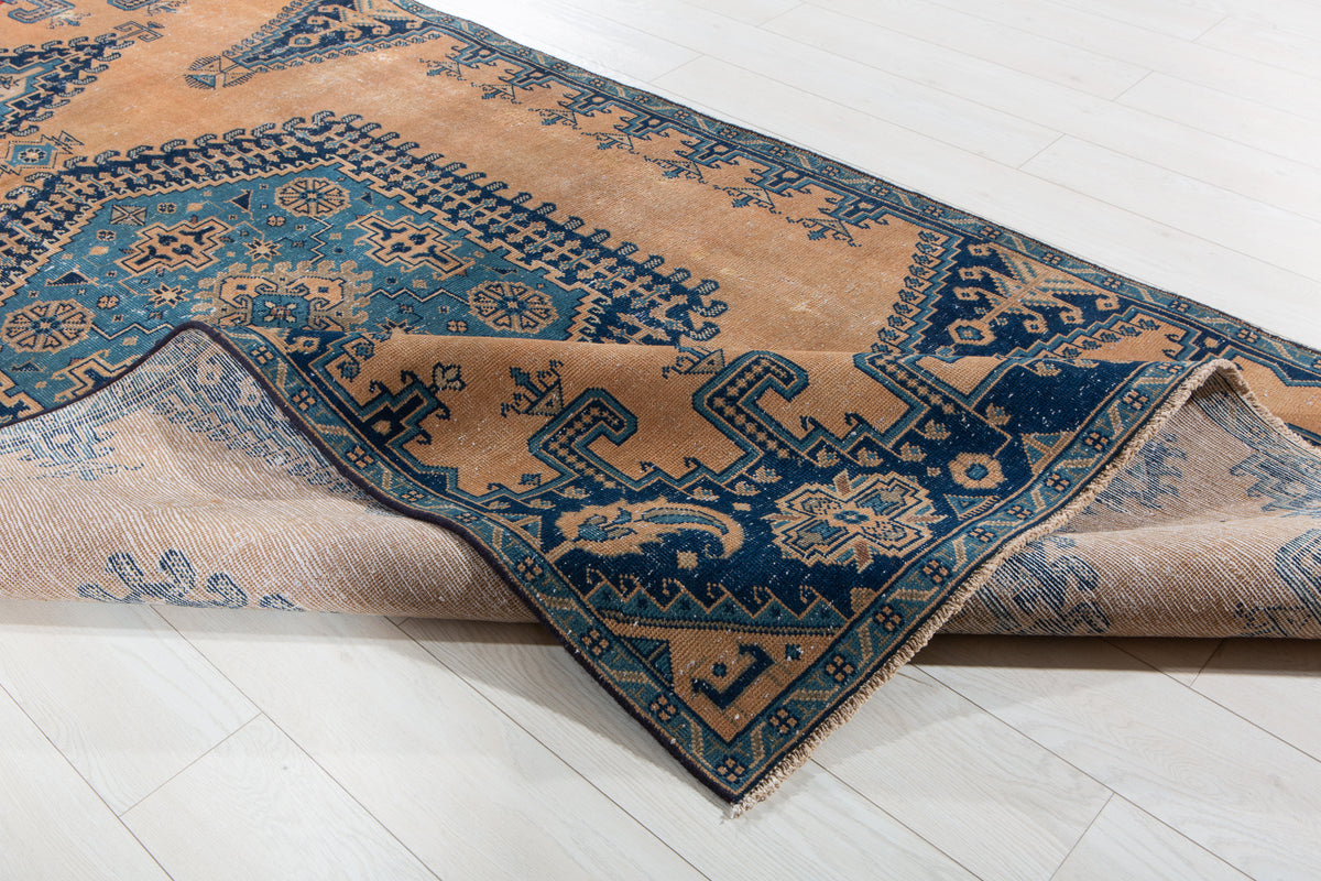 Collectible Antique Muted Orange & Blue Geometric Medallion Wool Rug – 9' 7" x 5' 1" (291 x 155 cm)