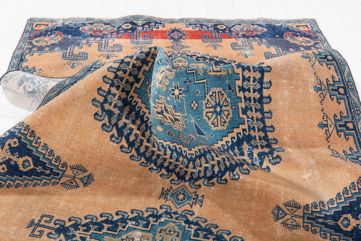 Collectible Antique Muted Orange & Blue Geometric Medallion Wool Rug – 9' 7" x 5' 1" (291 x 155 cm)