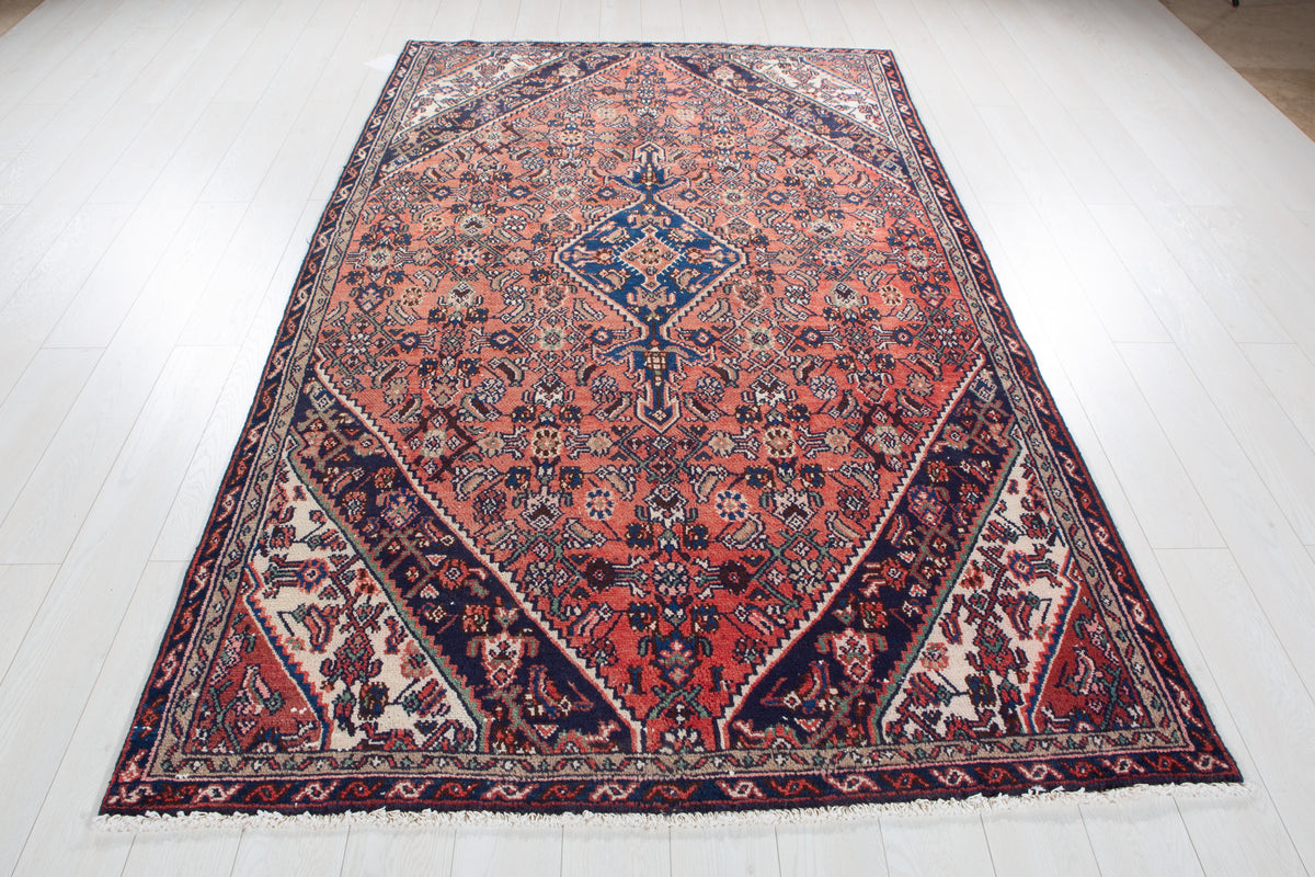 Vintage Red Hand-Knotted Wool Rug – 8' 11" x 5' 4" (271 x 163 cm)