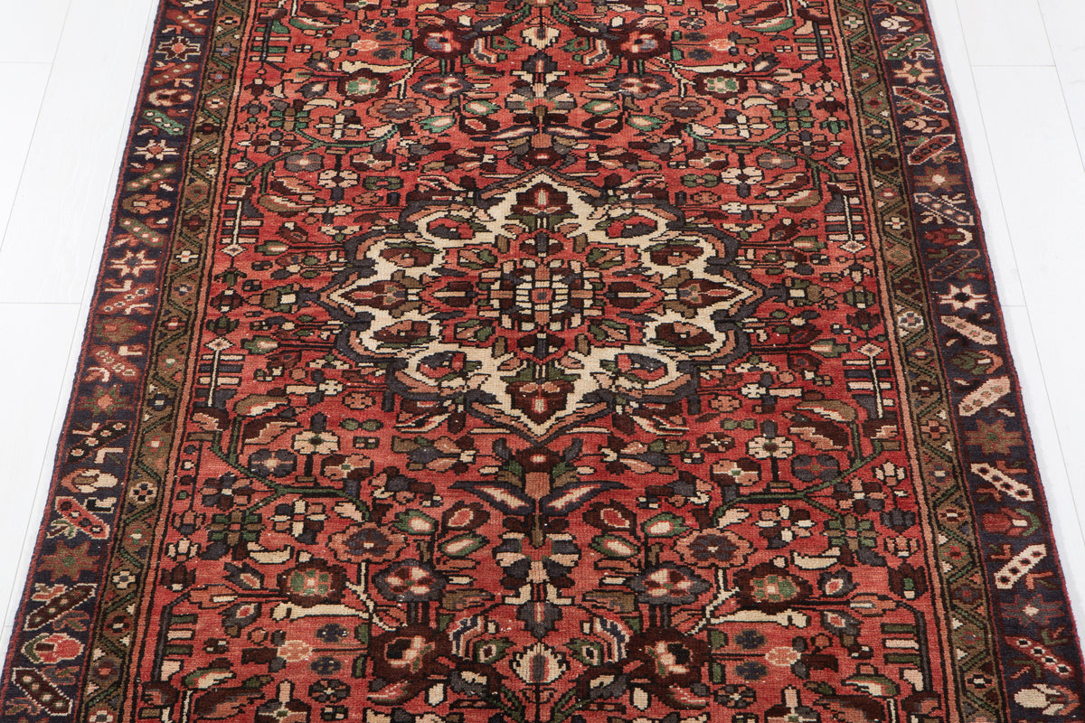 Vintage Red Hand-Knotted Wool Rug – 10' 5" x 4' 7" (318 x 139 cm)