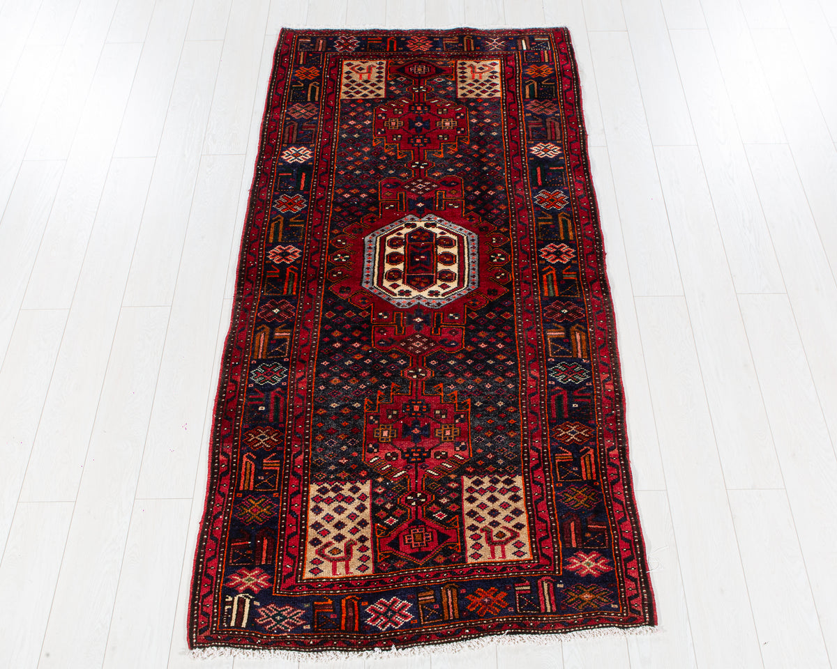 Vintage Navy Blue & Red Hand-Knotted Wool Rug – 7' 3" x 3' 6" (221 x 107 cm)