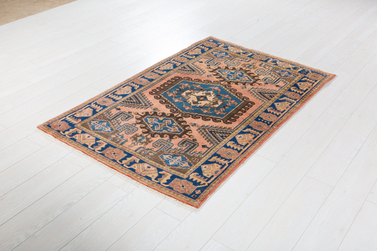 Small Antique Faded Salmon Pink Rug – 5' 5" x 3' 5" (164 x 104 cm)