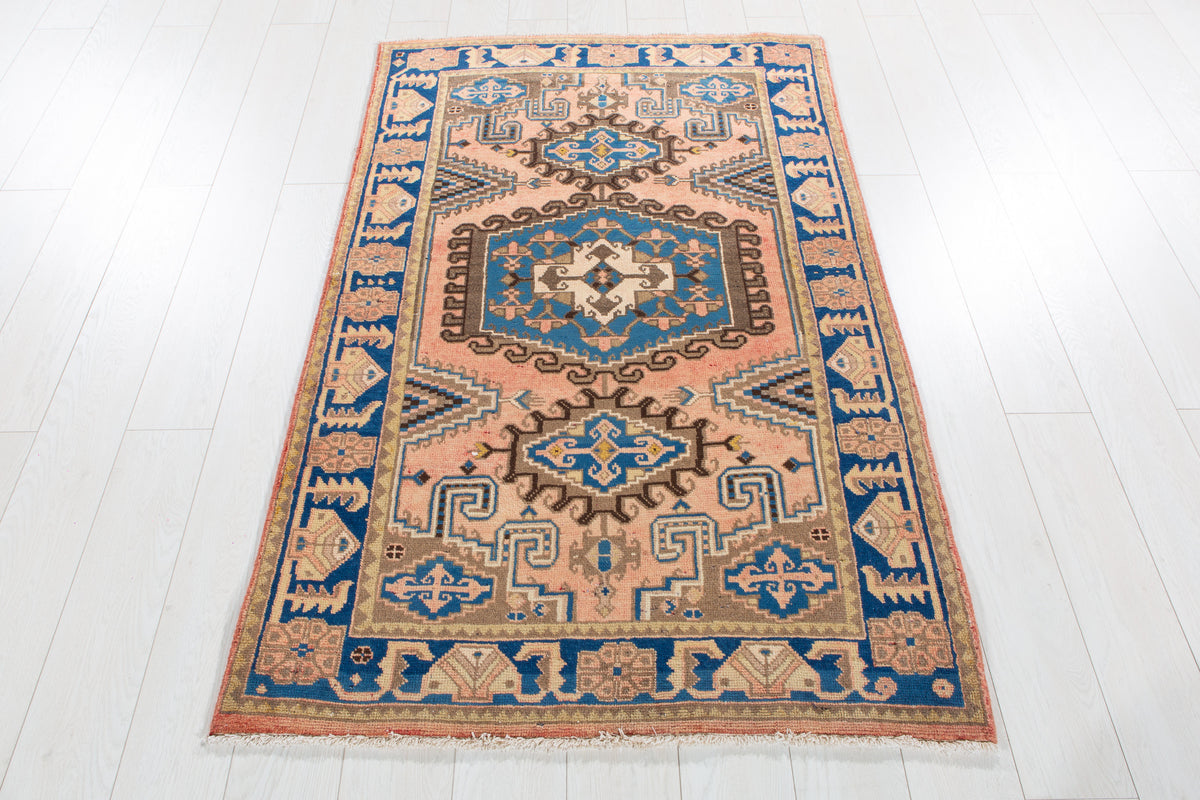 Small Antique Faded Salmon Pink Rug – 5' 5" x 3' 5" (164 x 104 cm)