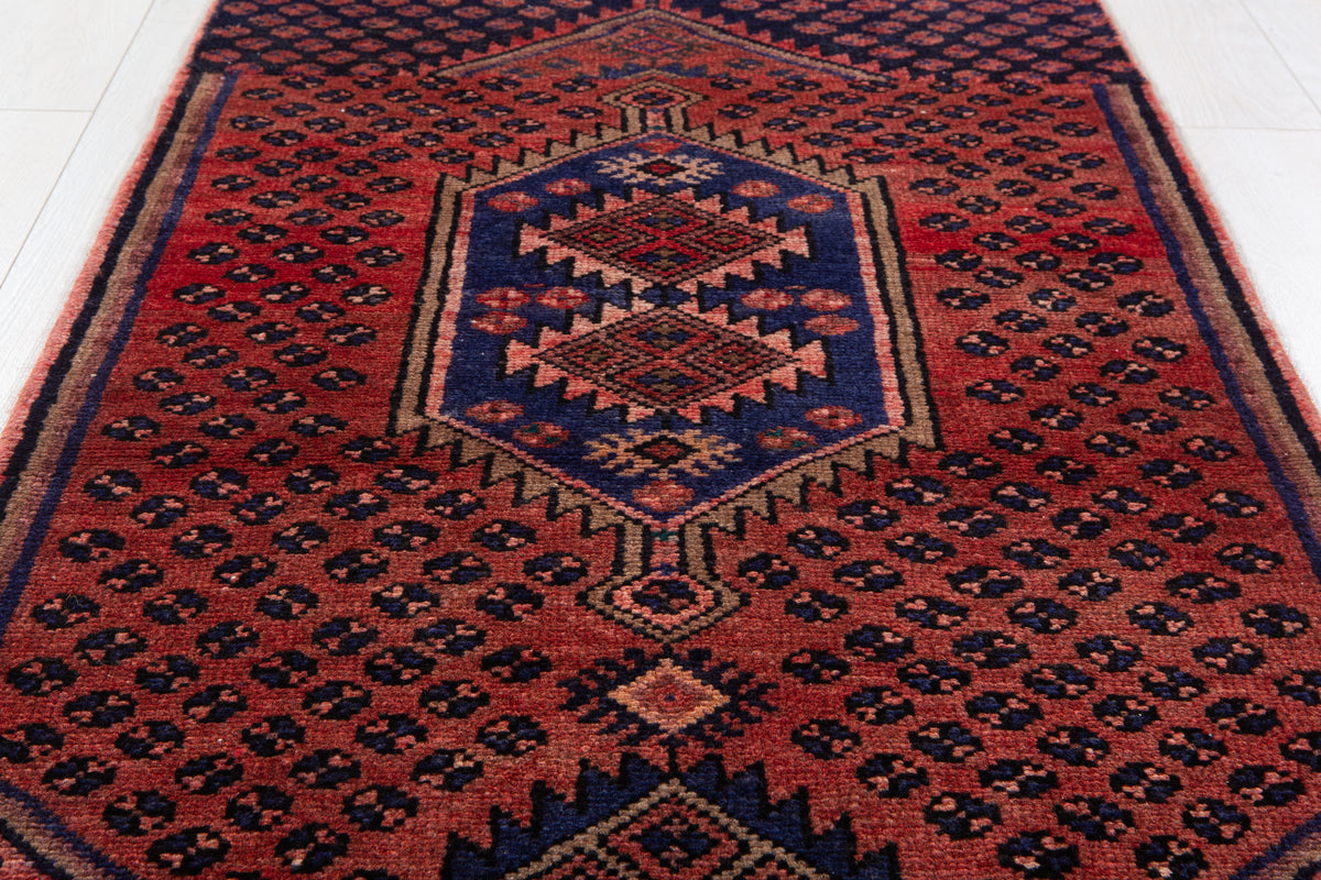 Small Vintage Rust Red & Navy Blue Rug – 4' 11" x 2' 4" (149 x 70 cm)