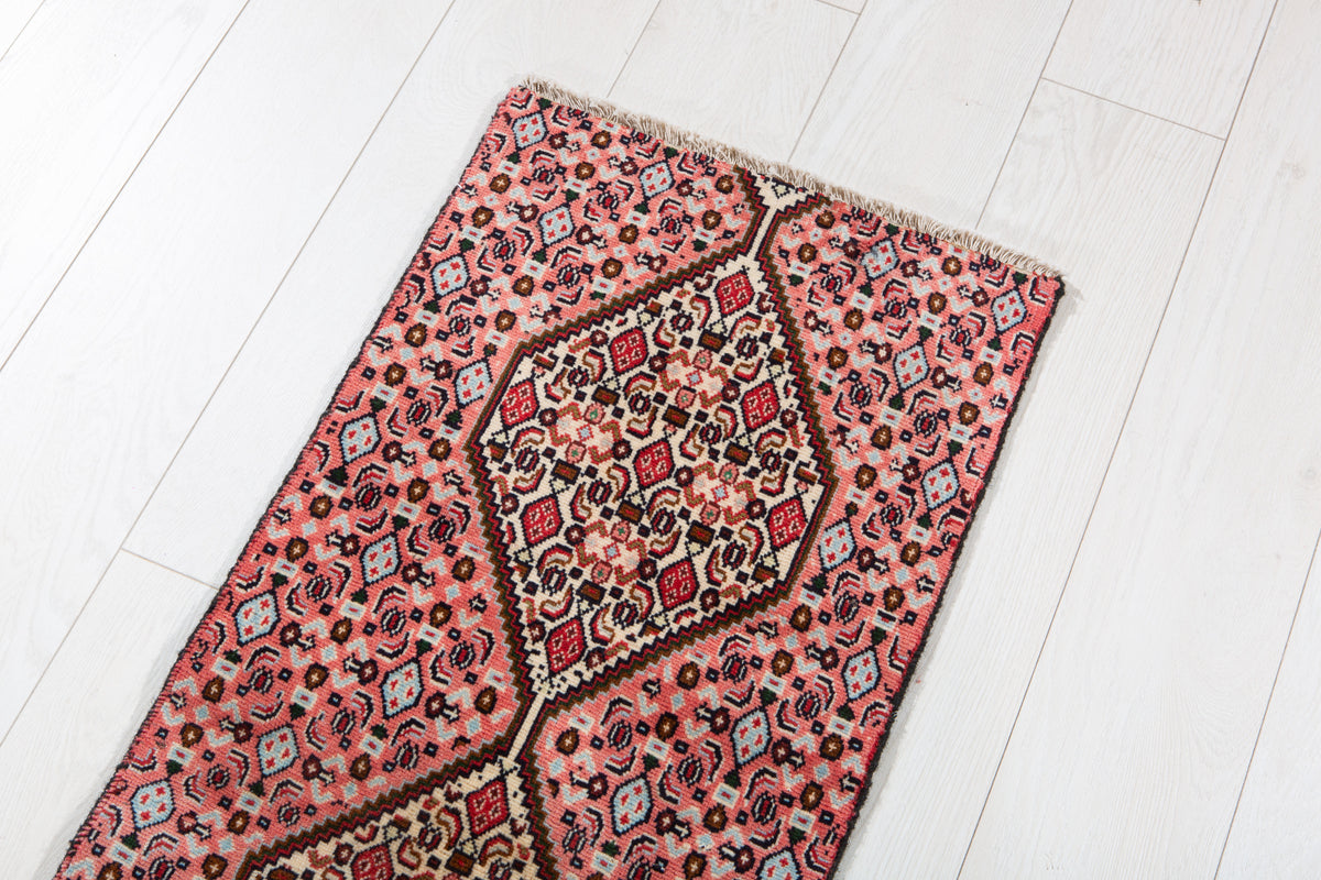 Small Antique Coral Pink Rug – 4' 1" x 1' 5" (124 x 43 cm)