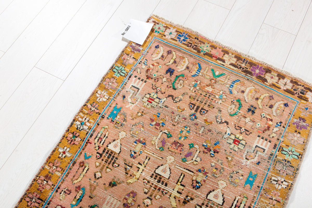 Small Antique Faded Pink Peach Rug – 5' 7" x 2' 7" (169 x 78 cm)