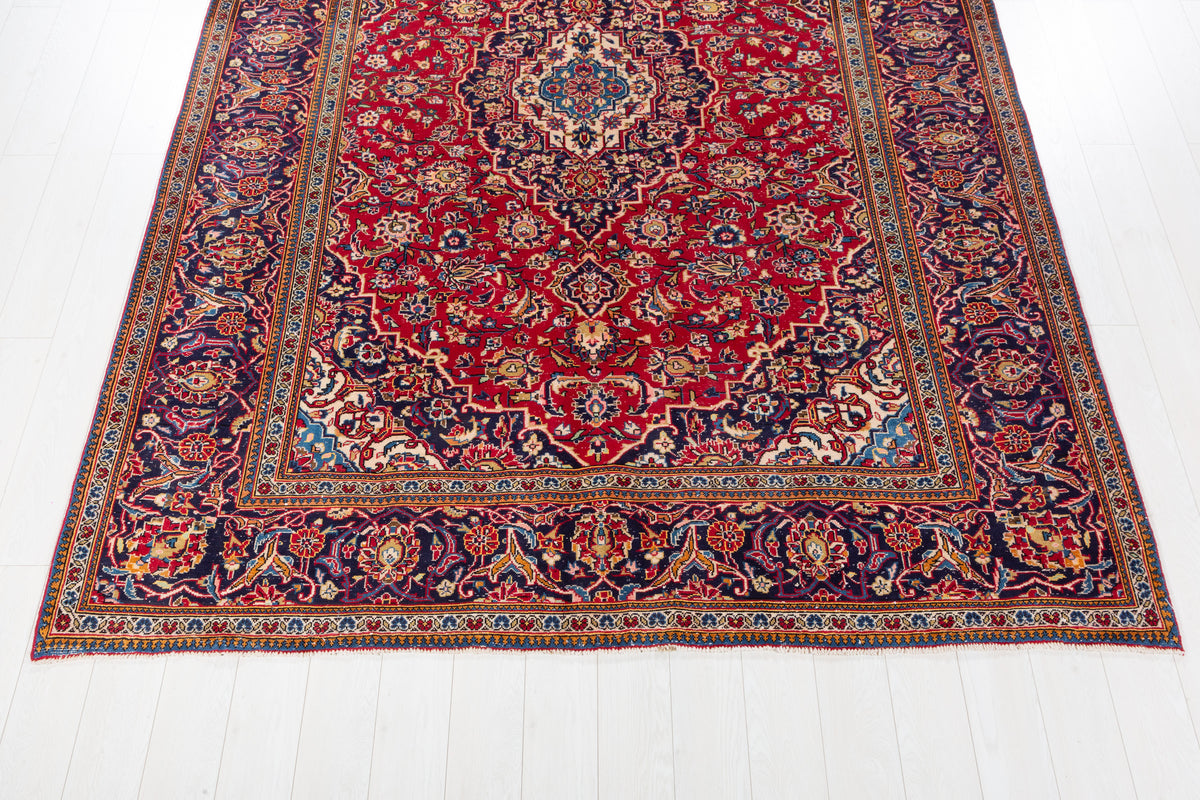 Vintage Red and navy Traditional Rug – 10' 6" x 7' 7" (321 x 232 cm)