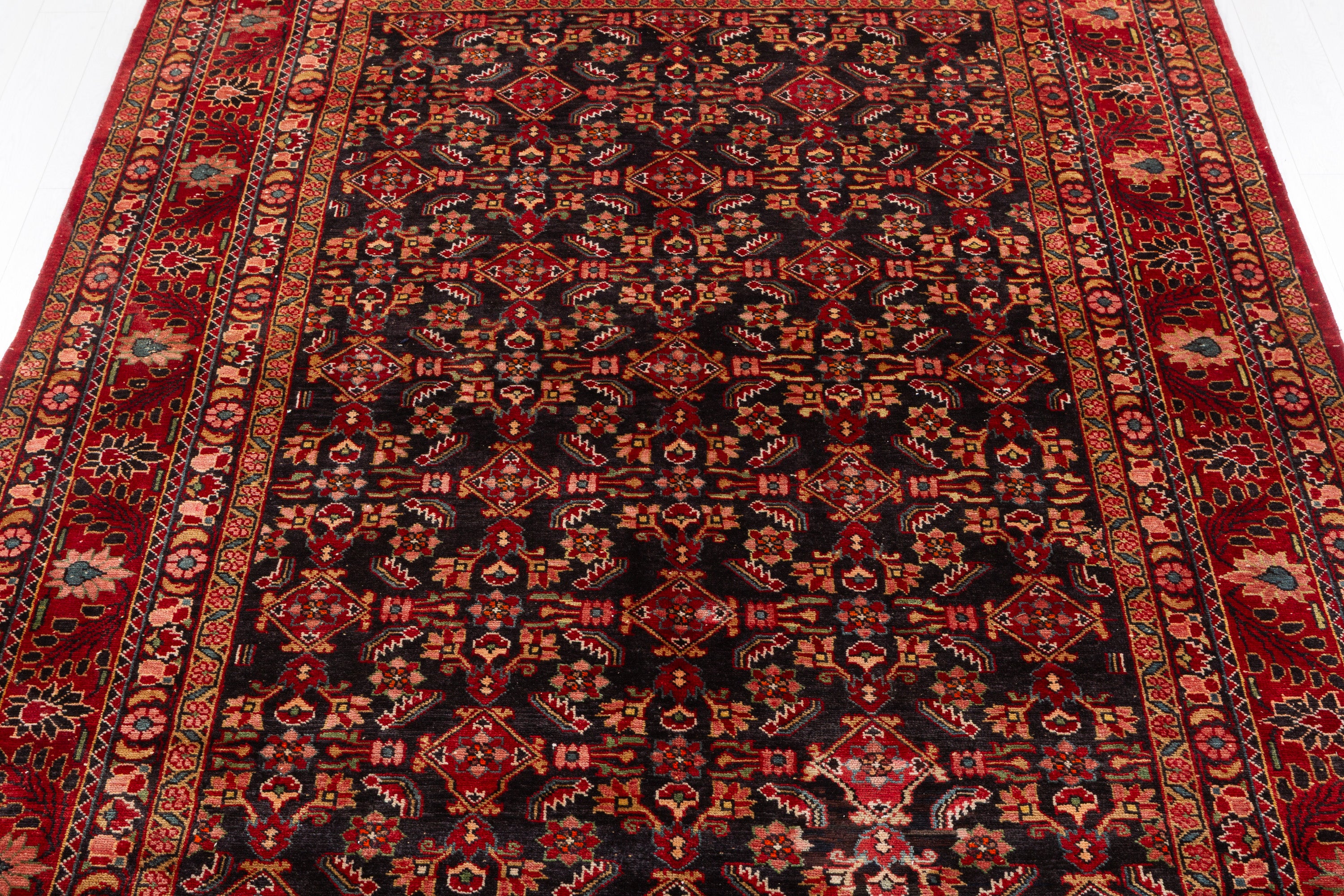 Collectible Vintage Dark navy and red Traditional Rug – 10' 1" x 7' 4" (307 x 224 cm)