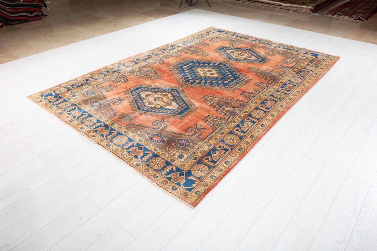 Collectible Vintage Faded orange-red and navy Geometric Rug – 9' 11" x 6' 7" (302 x 200 cm)