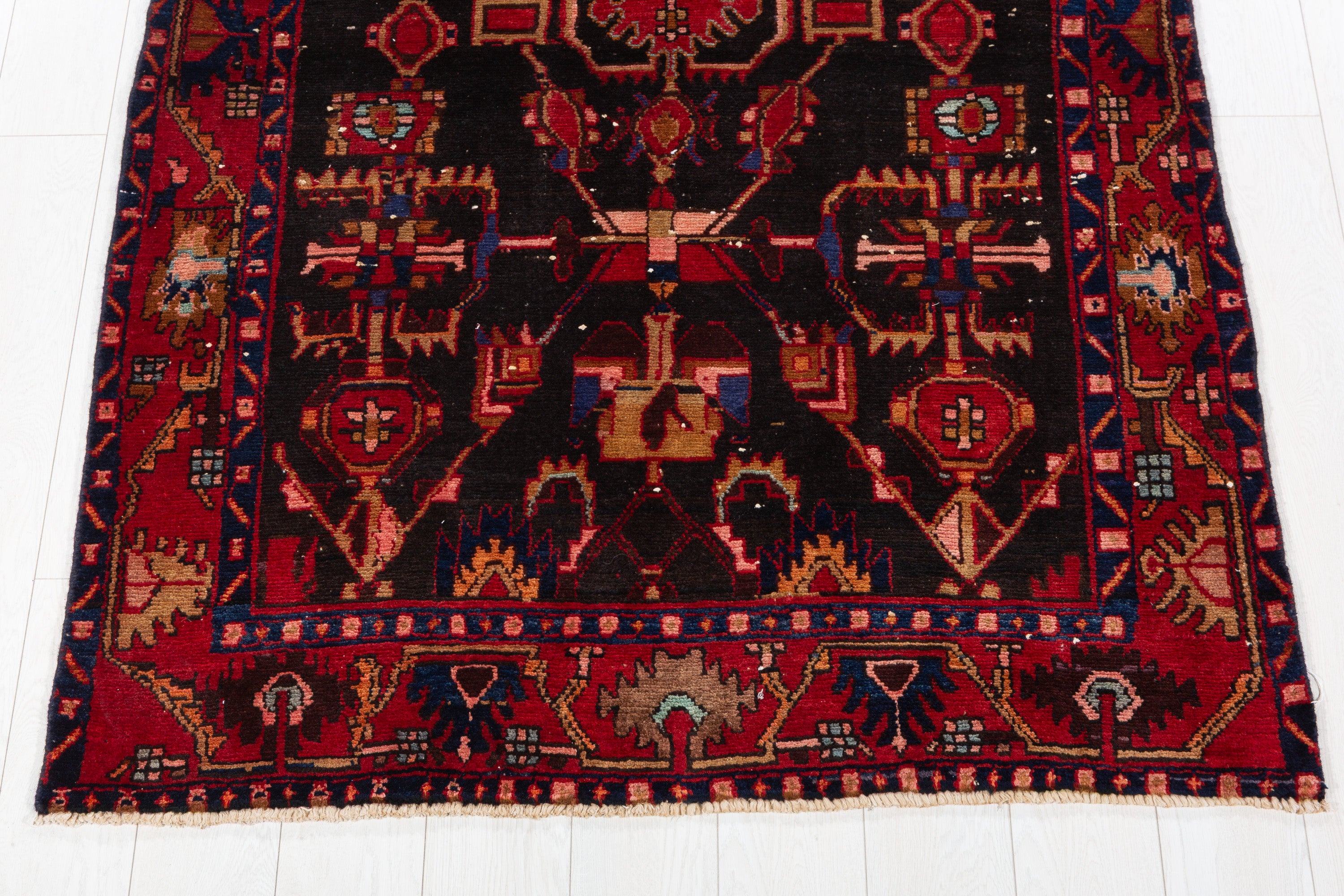 Collectible Vintage Black Red Animal Motif Area Rug – 6' 4" x 4' 3" (194 x 130 cm)