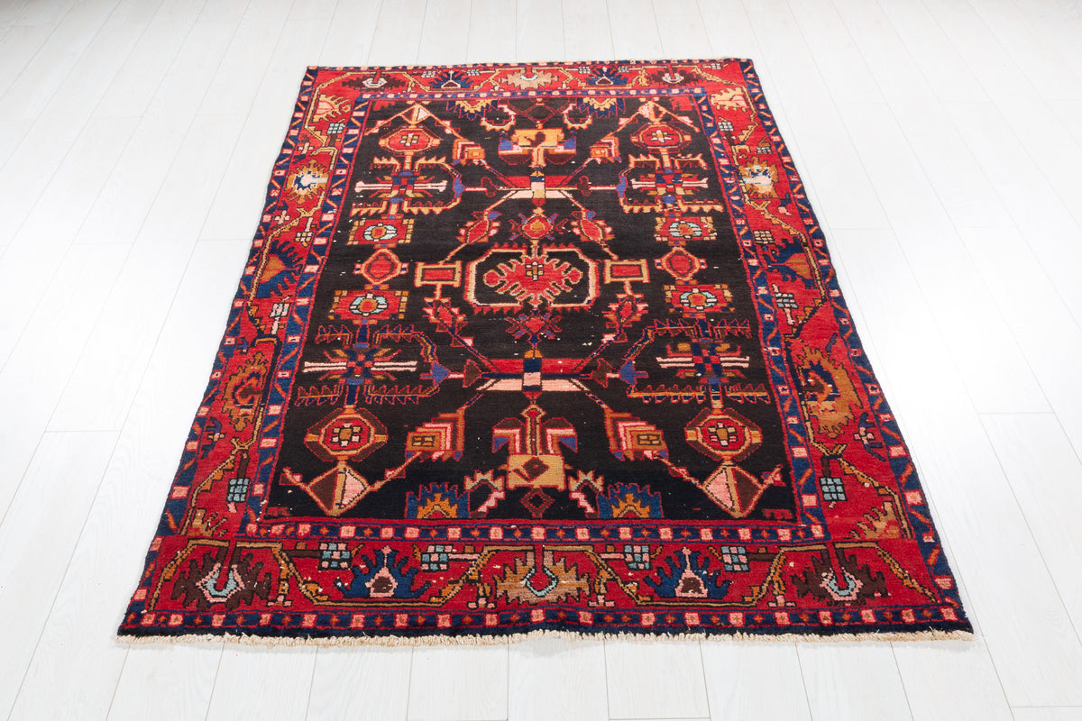 Collectible Vintage Black Red Animal Motif Area Rug – 6' 4" x 4' 3" (194 x 130 cm)