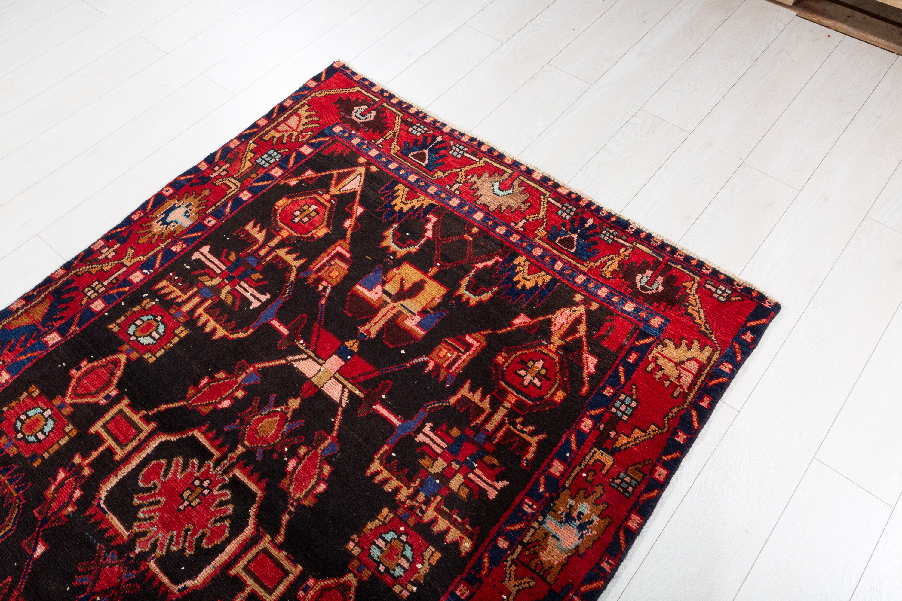 Collectible Vintage Black Red Animal Motif Area Rug – 6' 4" x 4' 3" (194 x 130 cm)