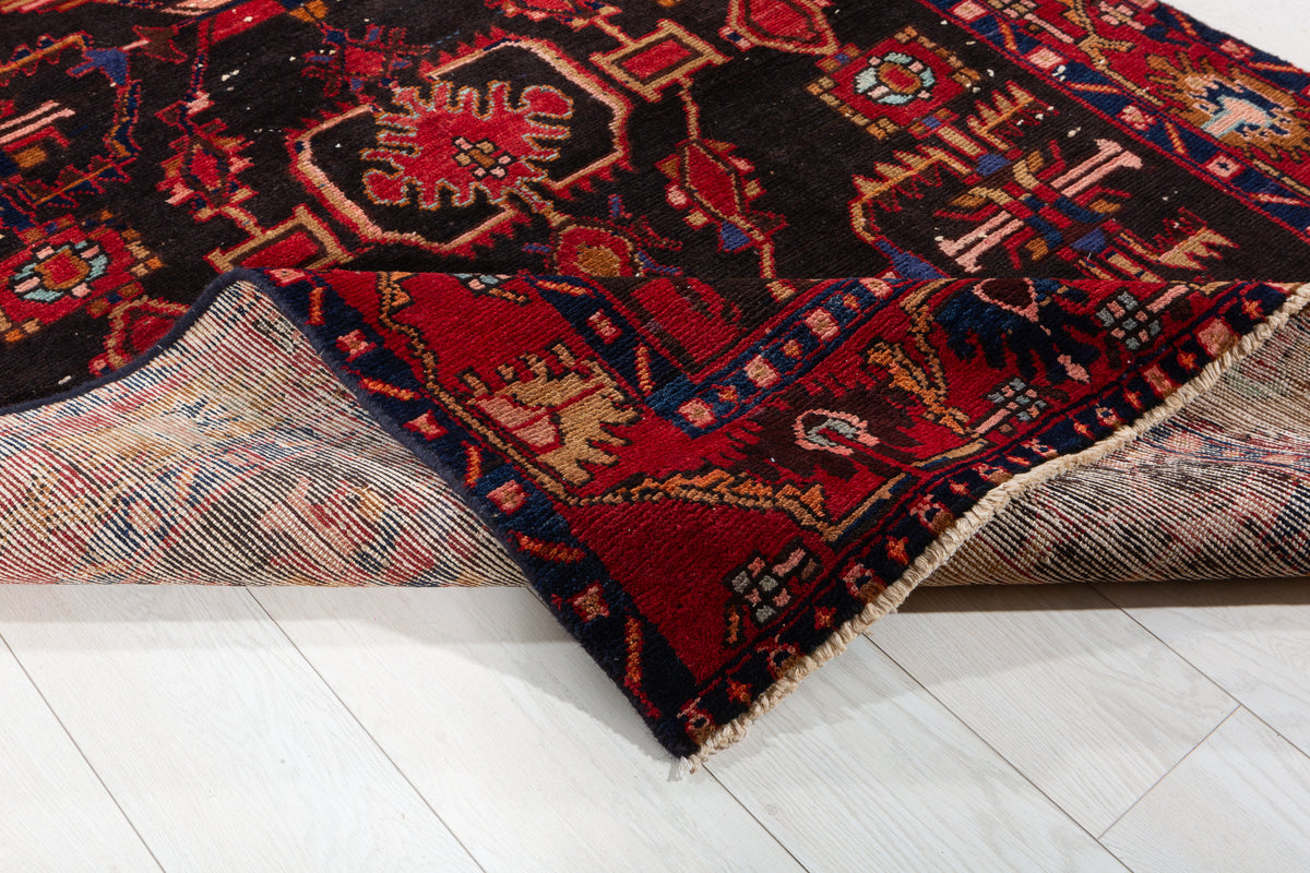 Collectible Vintage Black Red Animal Motif Area Rug – 6' 4" x 4' 3" (194 x 130 cm)