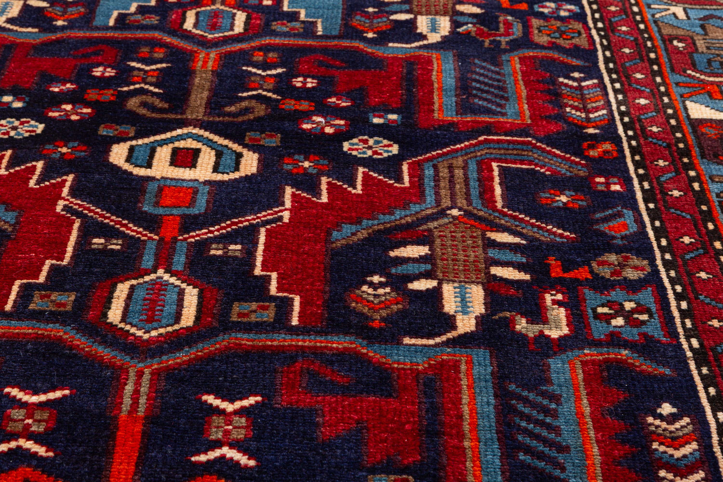 Collectible Vintage Navy Blue, Red Animal Motif Area Rug – 6' 11" x 4' 2" (212 x 127 cm)