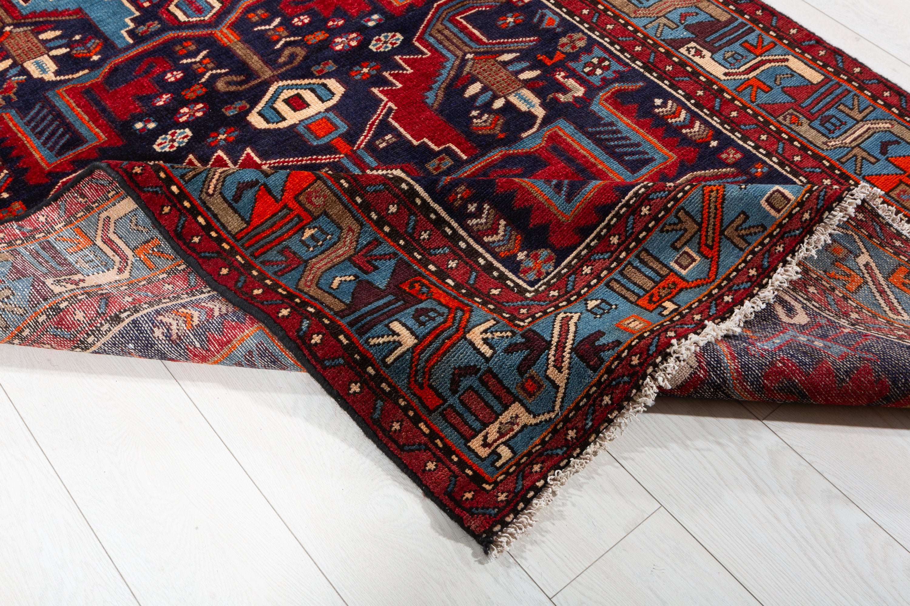 Collectible Vintage Navy Blue, Red Animal Motif Area Rug – 6' 11" x 4' 2" (212 x 127 cm)