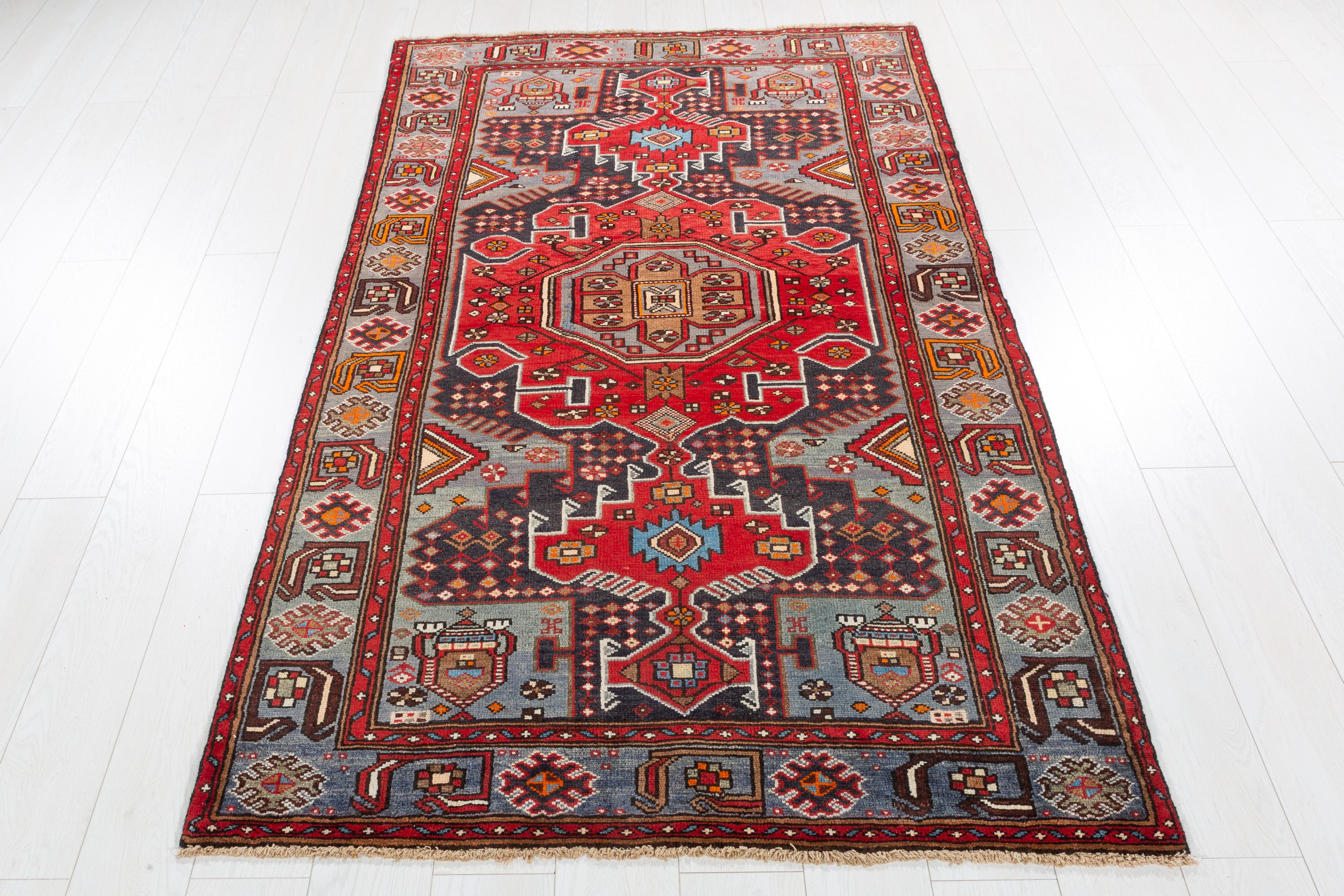 Collectible Vintage Red, Deep Navy Blue Geometric Medallion Area Rug – 6' 7" x 4' 0" (201 x 122 cm)
