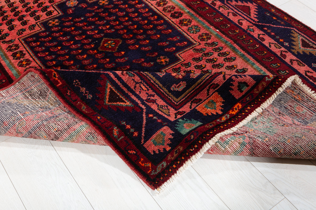Collectible Vintage Maroon & Pink Geometric Area Rug – 6' 9" x 4' 5" (207 x 134 cm)