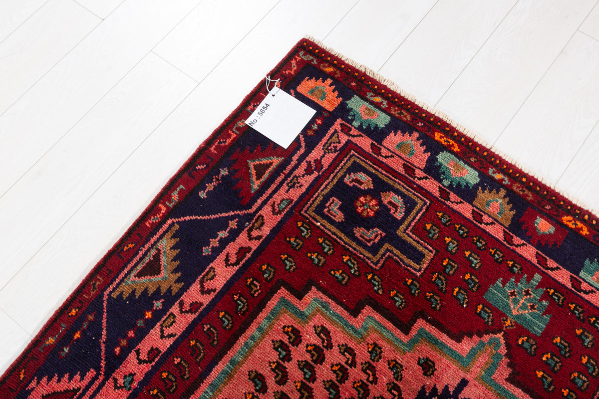 Collectible Vintage Maroon & Pink Geometric Area Rug – 6' 9" x 4' 5" (207 x 134 cm)