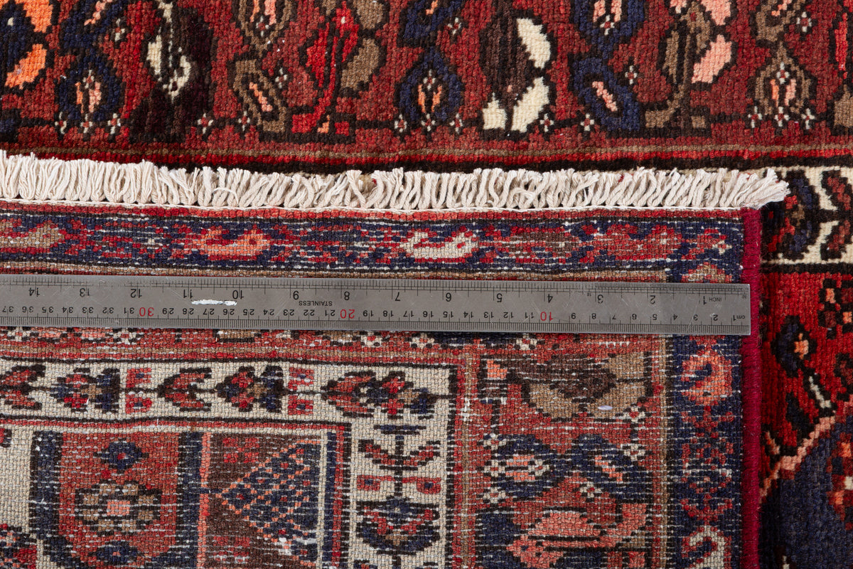 Tapis vintage rouge rouille et bleu marine à médaillon central – 6' 10" x 3' 3" (208 x 100 cm)