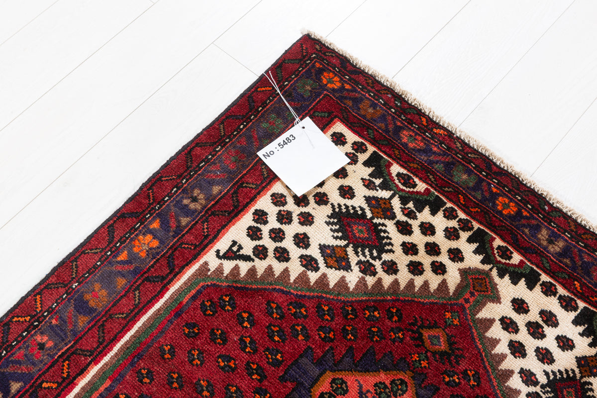 Tapis vintage rouge rouille et bleu marine à médaillon losangé – 6' 6" x 3' 5" (198 x 104 cm)