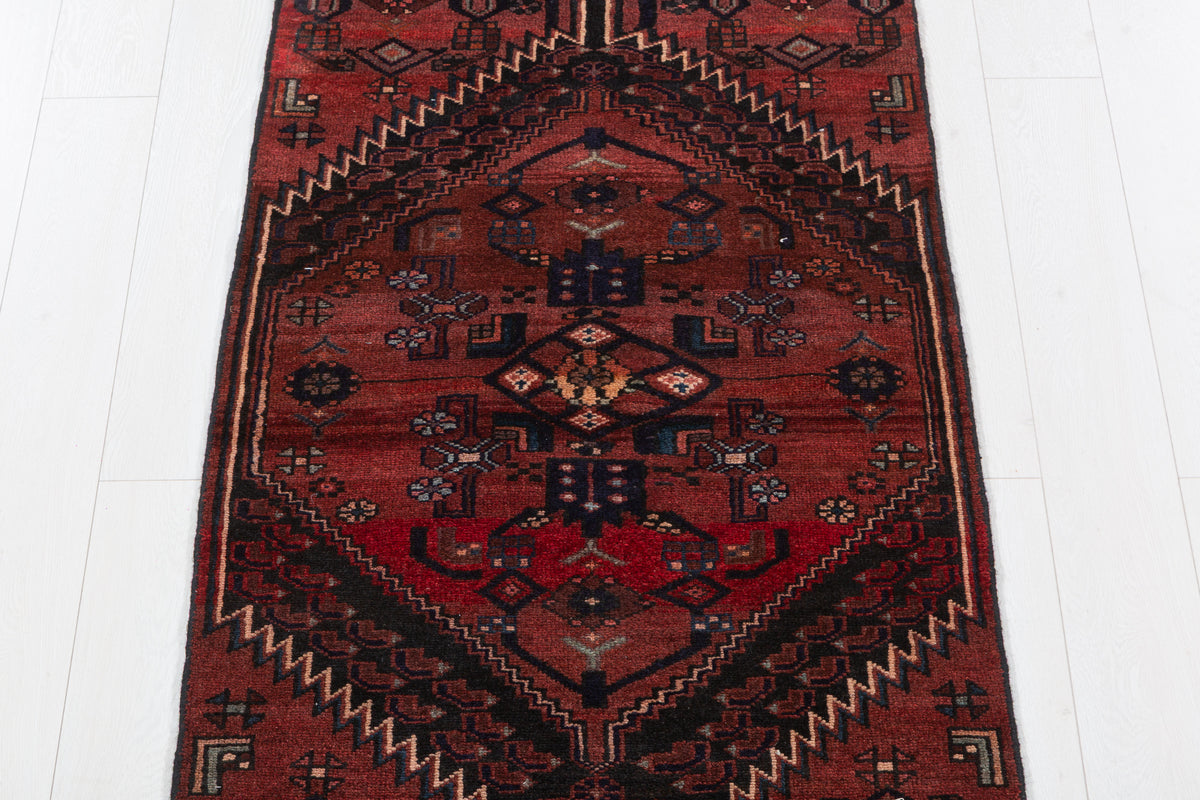 Vintage Rust Red and Black Narrow Geometric Medallion Hand-Knotted Area Rug – 6' 6" x 2' 9" (199 x 84 cm)
