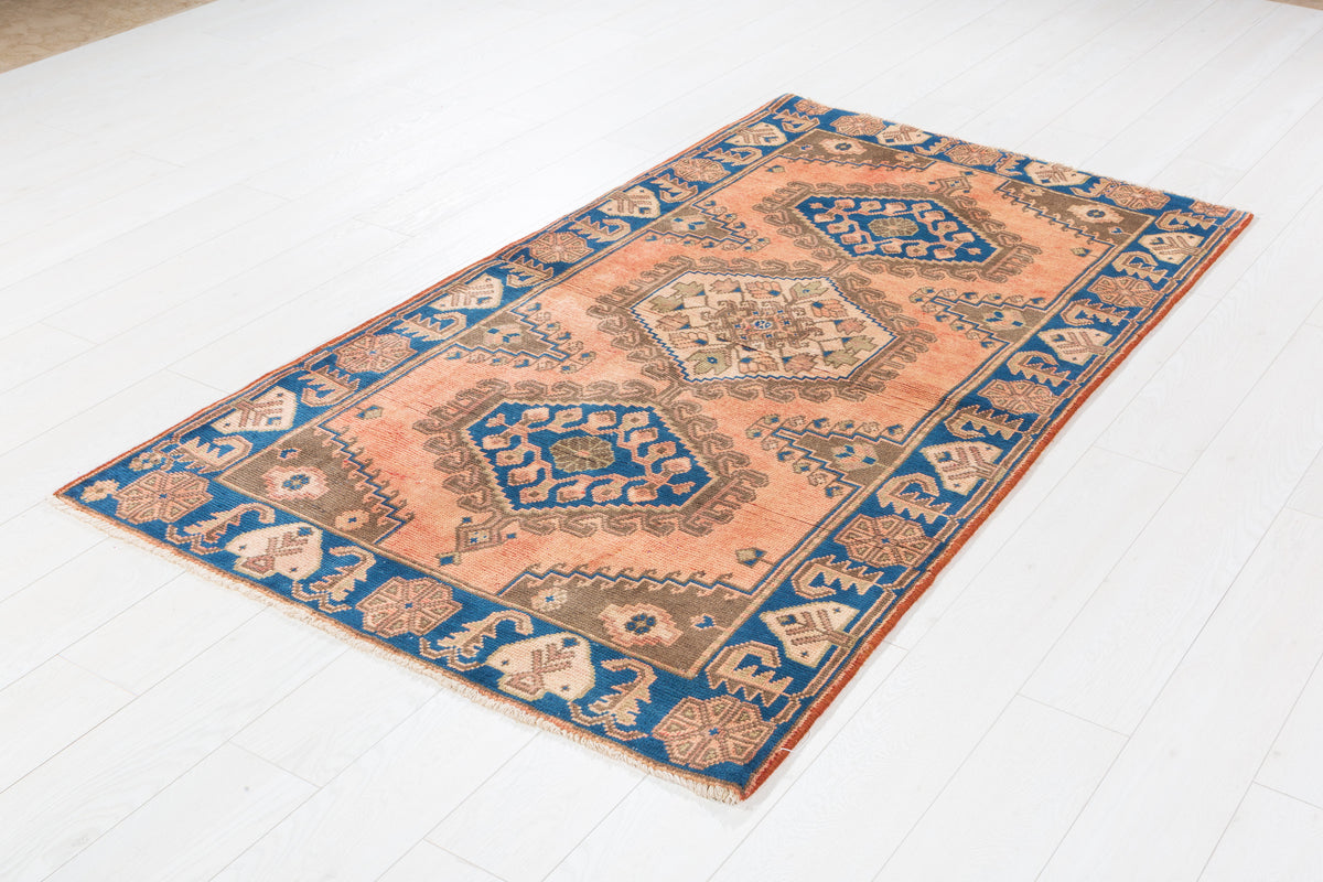 Collectible Vintage Faded Peach and Blue Triple Diamond Medallion Hand-Knotted Area Rug – 6' 6" x 3' 7" (199 x 108 cm)