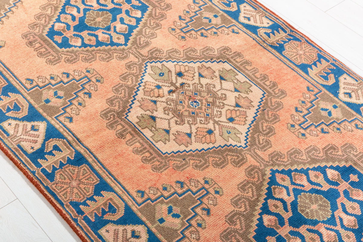 Collectible Vintage Faded Peach and Blue Triple Diamond Medallion Hand-Knotted Area Rug – 6' 6" x 3' 7" (199 x 108 cm)