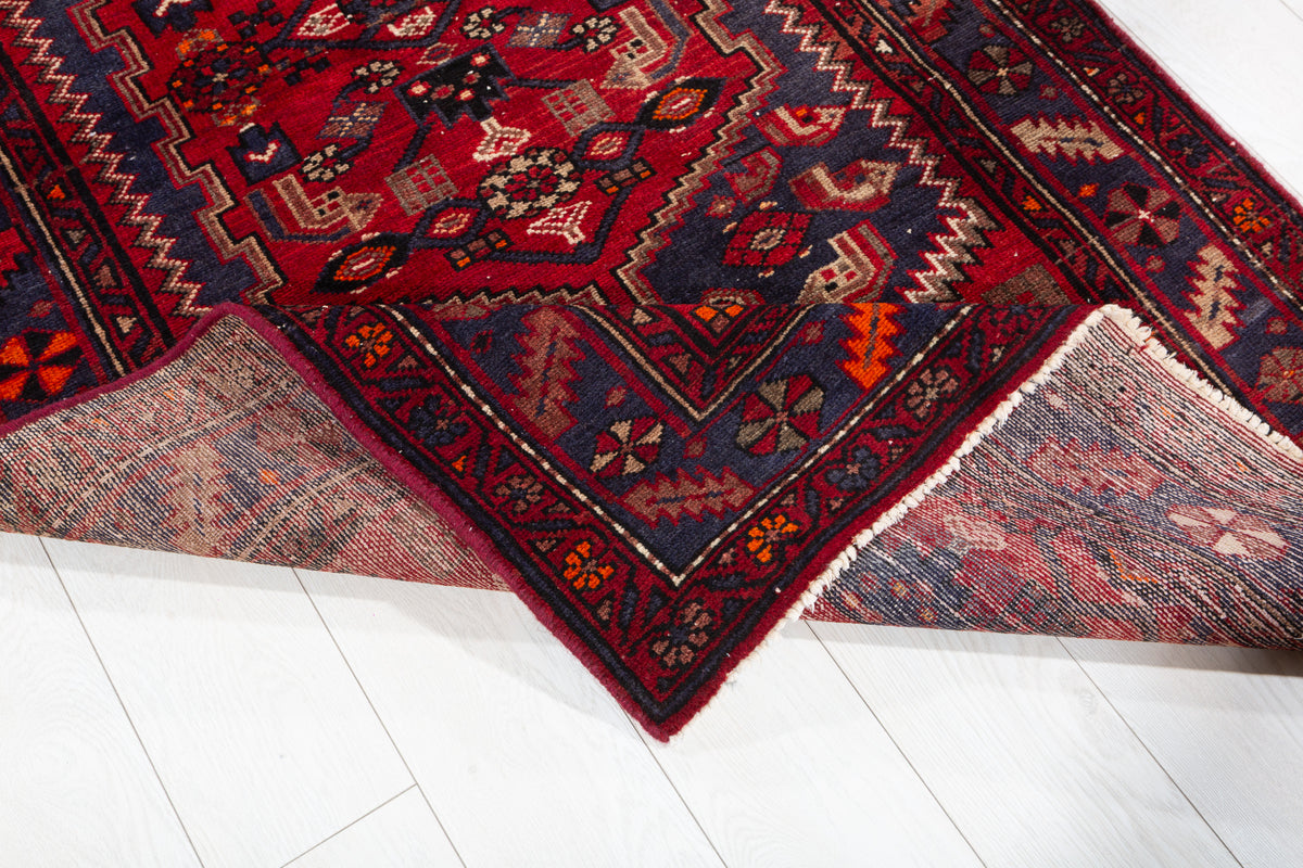 Vintage Red and Faded Navy Blue Geometric Hand-Knotted Area Rug – 6' 11" x 3' 7" (212 x 110 cm)