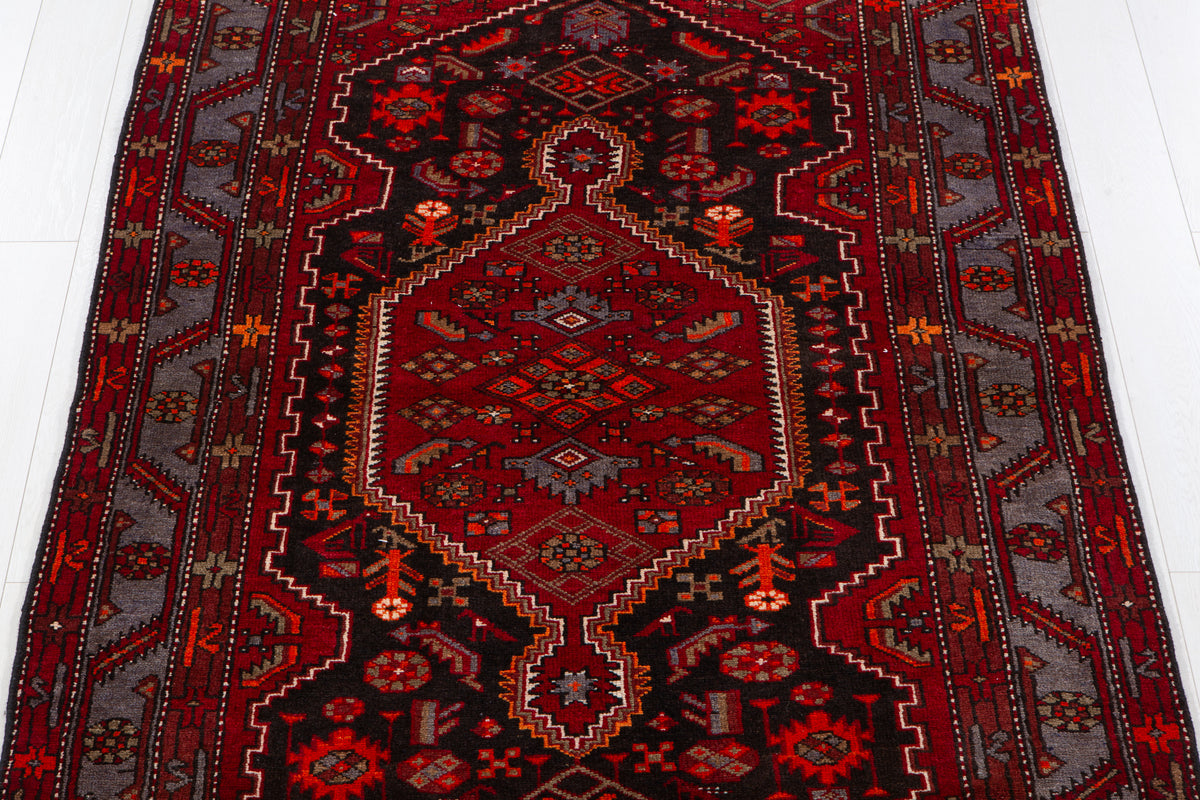 Vintage Black & Red Geometric Medallion Wool Rug – 8' 4" x 4' 7" (255 x 139 cm)
