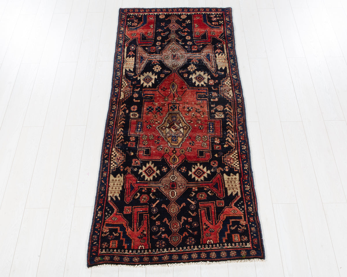 Antique Kurdish wool rug in Deep navy blue, red, 218 x 94 cm