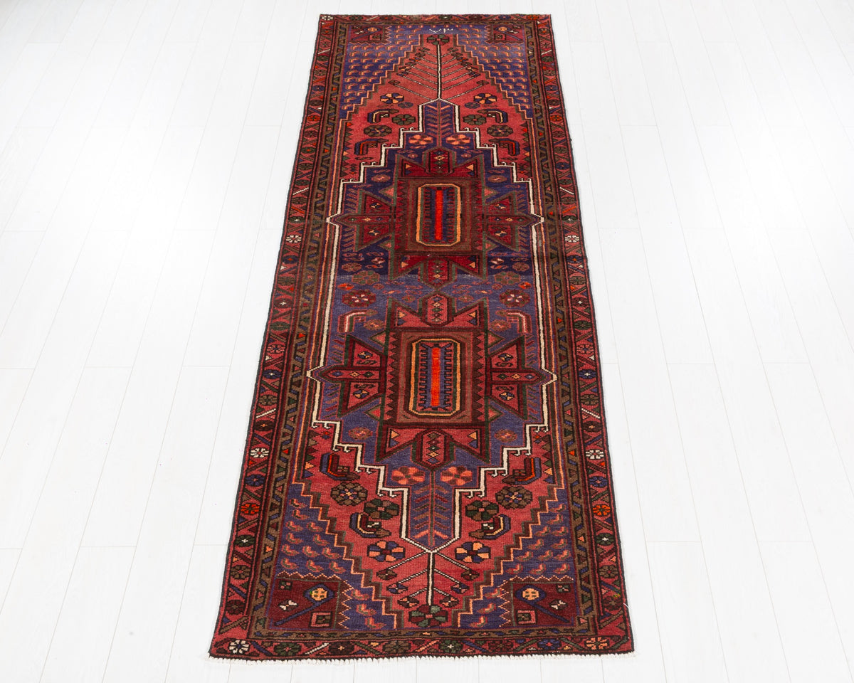 Vintage Zanjan wool runner in coral and navy blue with bold stacked geometric medallions, 3x10, SKU 5121