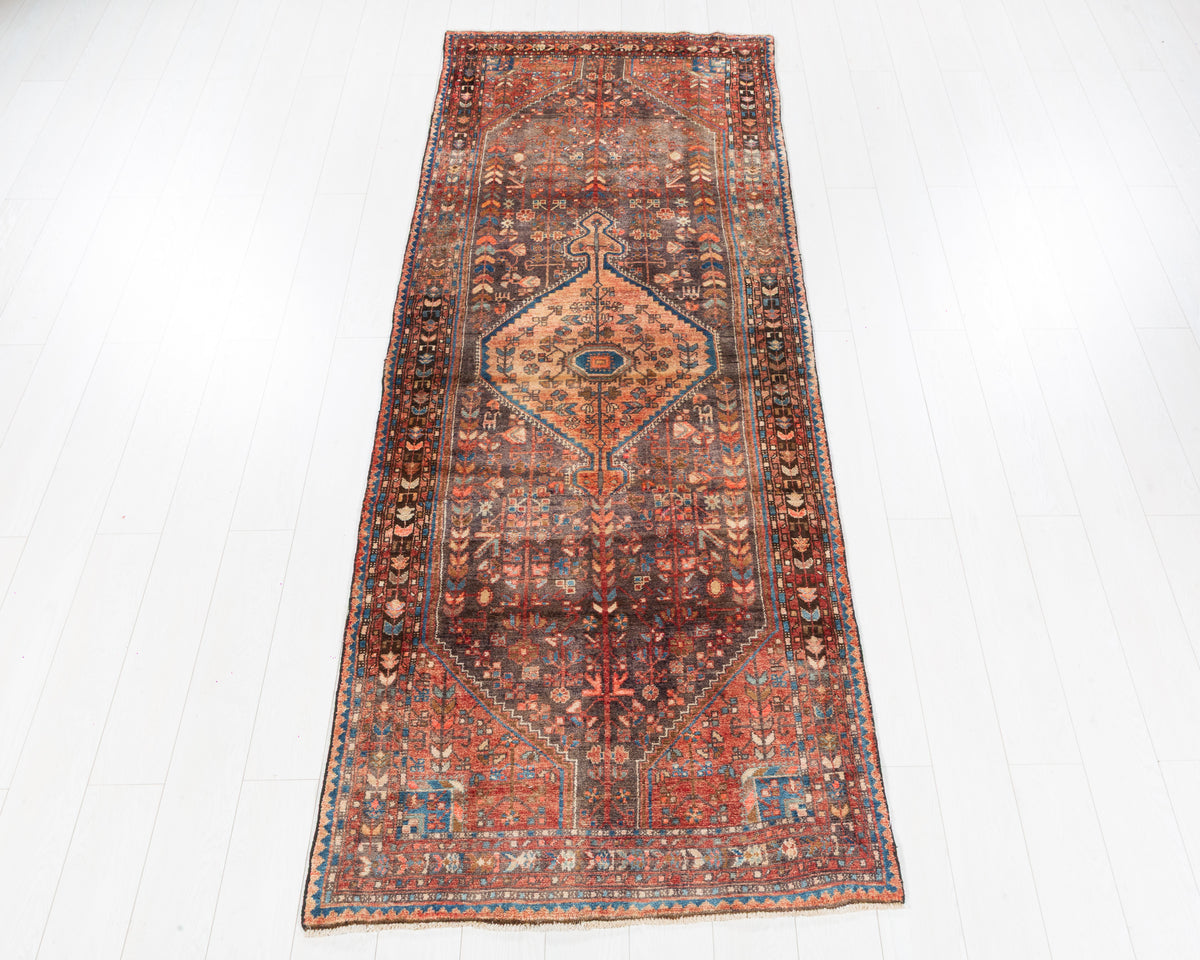 Vintage Toiserkan geometric medallion wool runner rug, faded peach, SKU 5255
