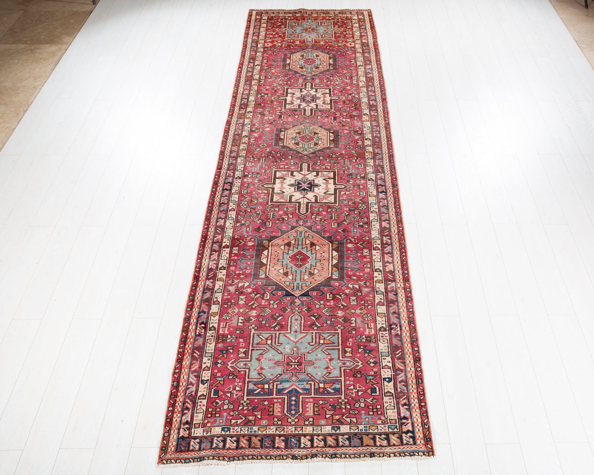 Vintage Heriz Gharajeh repeating medallion wool runner rug, pinkish red, SKU 5257