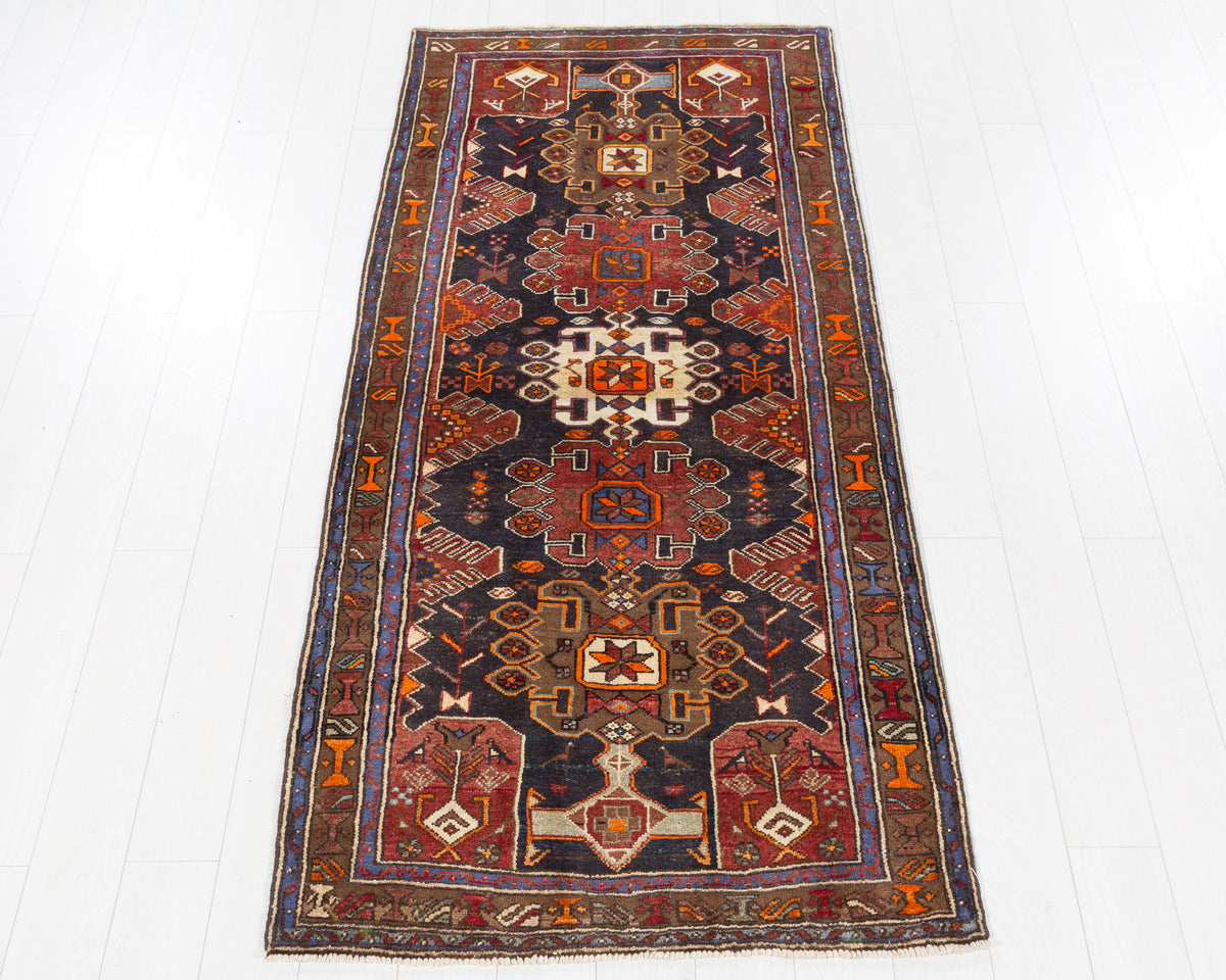 Vintage Tarom geometric medallion wool runner rug, navy blue and rust red, SKU 5268