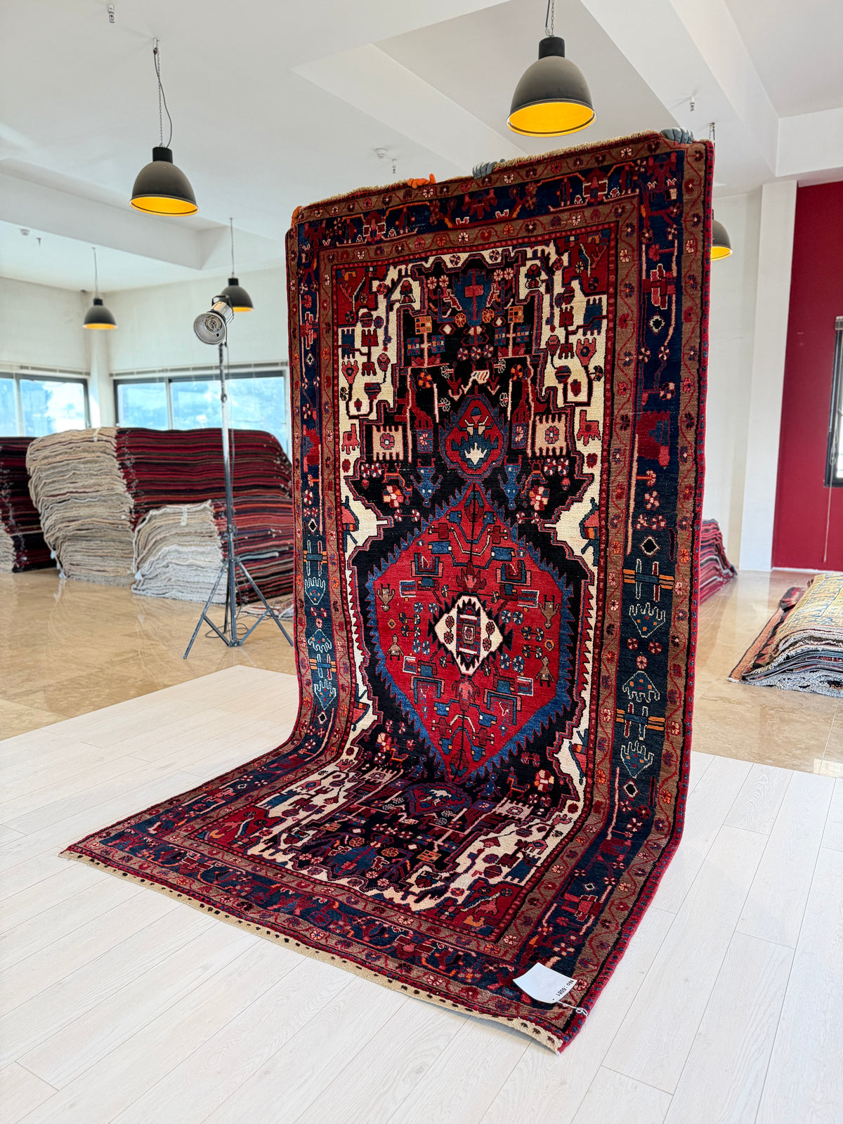 Antique Navy Blue & Red Geometric Medallion Wool Rug – 10' 5" x 5' 3" (317 x 161 cm)