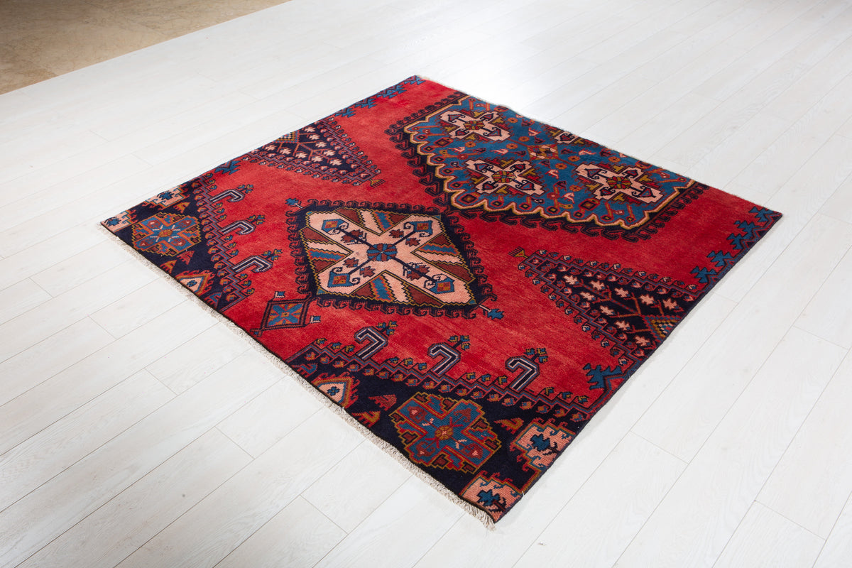 Vintage Red & Blue Geometric Medallion Wool Rug – 5' 0" x 5' 4" (152 x 162 cm)