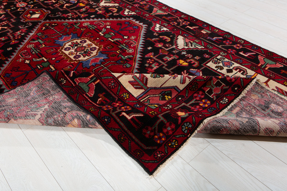 Vintage Deep Navy Blue & Red Geometric Medallion Wool Rug – 9' 7" x 5' 7" (293 x 169 cm)