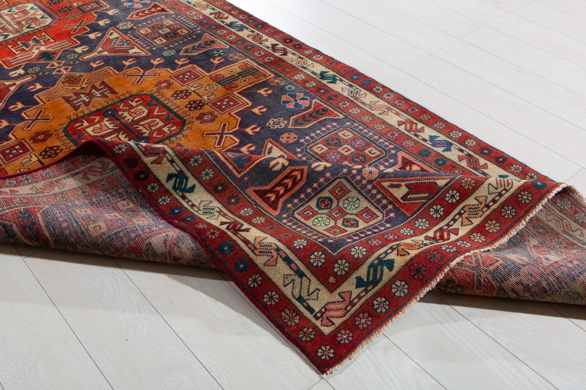 Vintage Navy Blue & Red Geometric Medallion Wool Rug – 9' 3" x 4' 4" (282 x 131 cm)