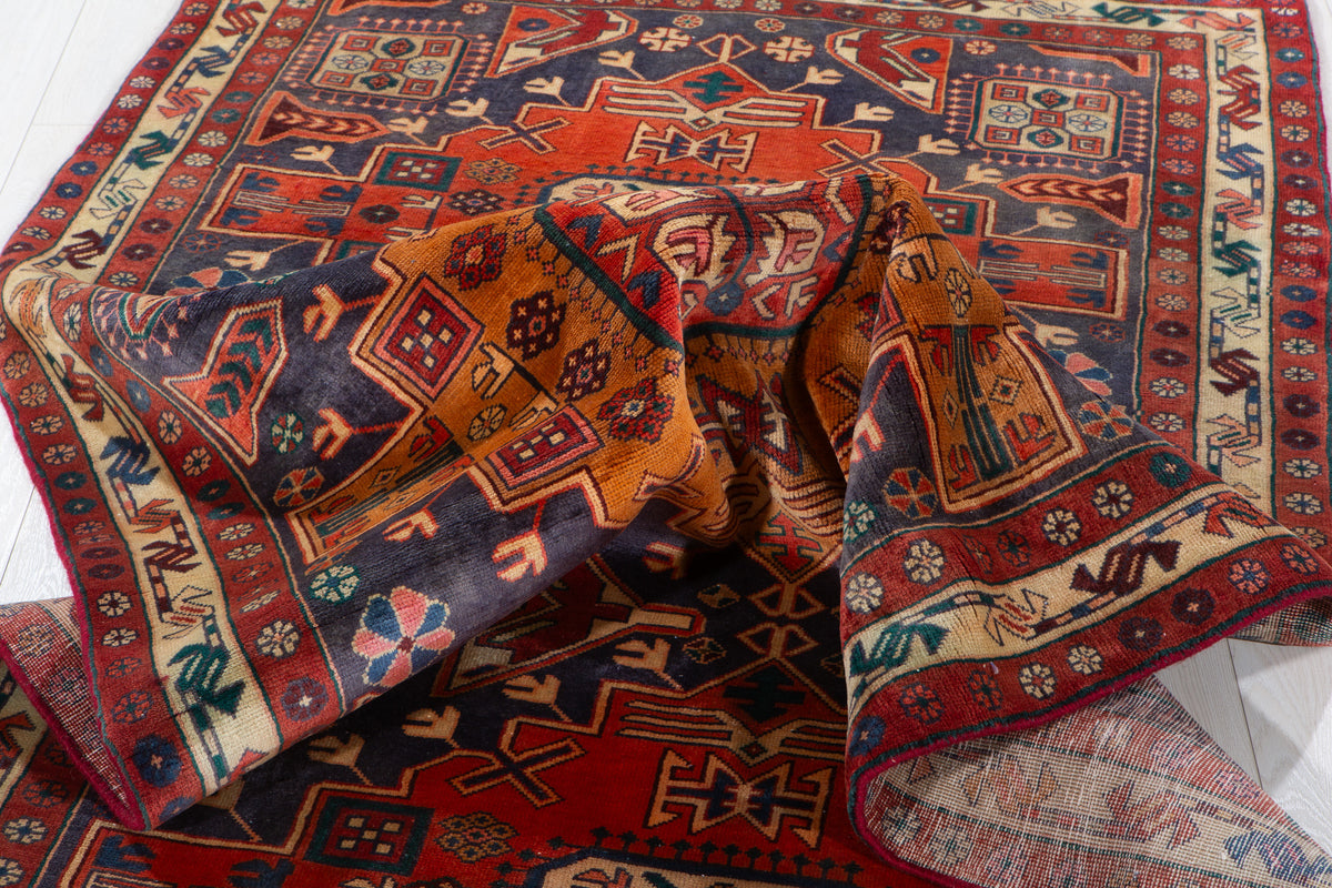 Vintage Navy Blue & Red Geometric Medallion Wool Rug – 9' 3" x 4' 4" (282 x 131 cm)