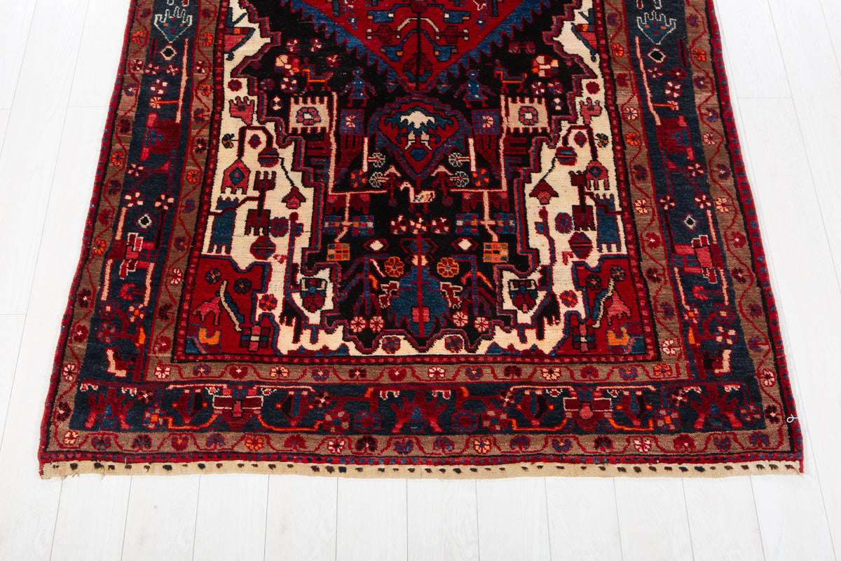 Antique Navy Blue & Red Geometric Medallion Wool Rug – 10' 5" x 5' 3" (317 x 161 cm)
