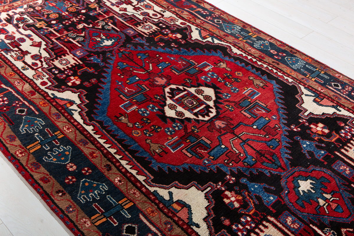 Antique Navy Blue & Red Geometric Medallion Wool Rug – 10' 5" x 5' 3" (317 x 161 cm)